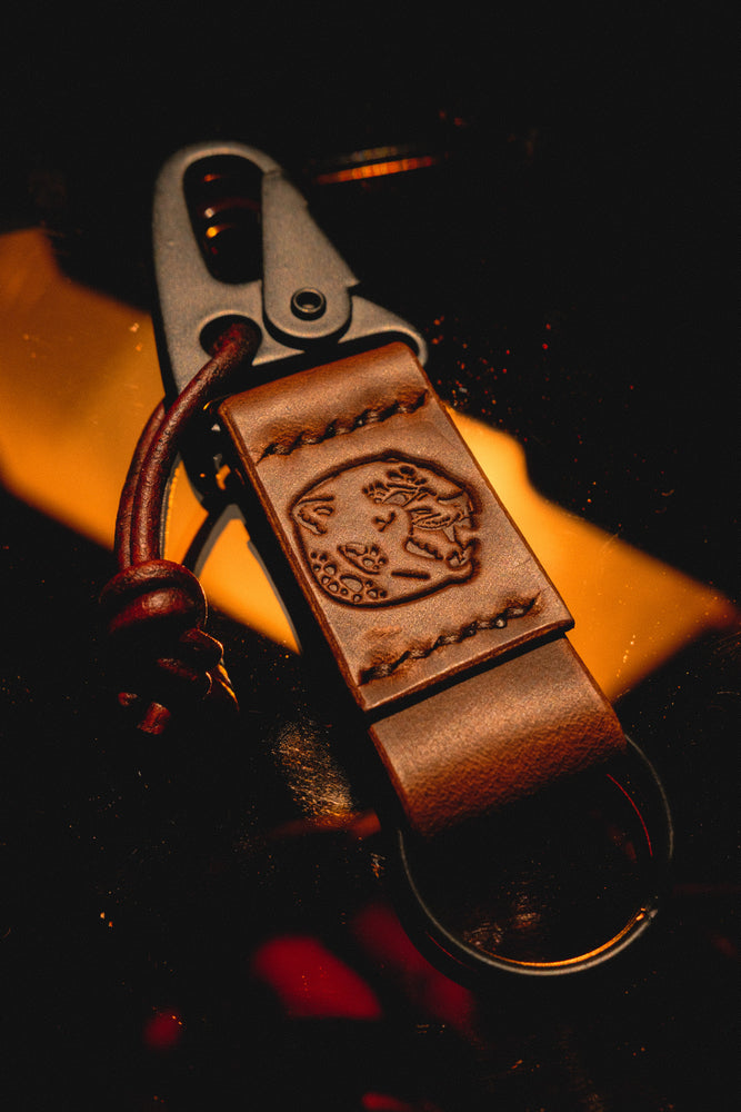 
            
                Load image into Gallery viewer, Revolver x Oscar &amp;amp; Wells Leather Keychain (Espresso)
            
        
